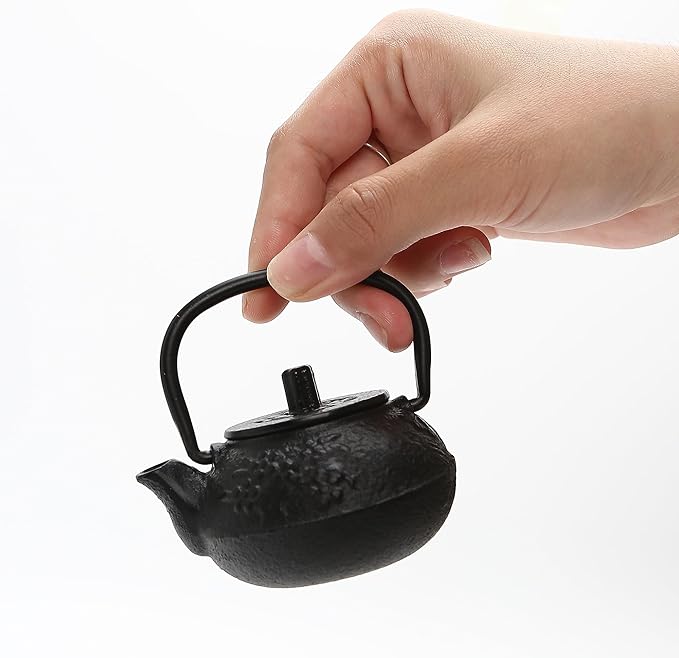 50ml(1.7oz) Mini Cast Iron Teapot, Imitation Japanese Kettle with Copper Handle and Bamboo Root Beam, Perfect for Home Tea and Coffee Serveware Decoration - Mini size only – fits in your palm