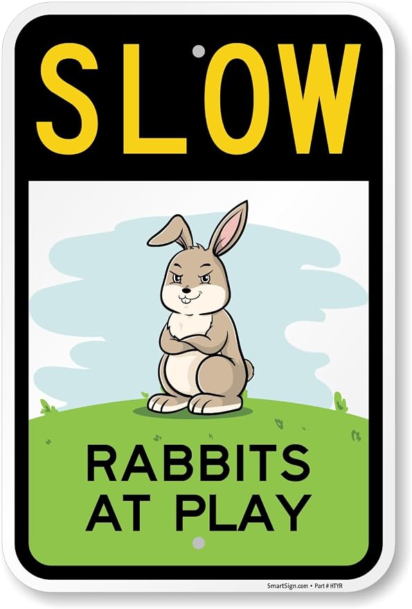 SmartSign Slow Rabbits At Play Funny Animal Sign - 12" x 18", 63 mil Laminated Rustproof Aluminum Metal, Pre-Drilled Holes, For Gift, Yard, Cafe, Room Decor, Outdoor, Made in USA by SmartSign