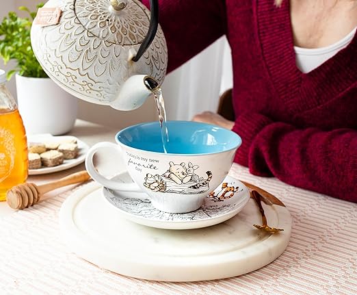 Silver Buffalo Disney Winnie the Pooh Walking Classic Scene Ceramic Teacup and Saucer, 12 Ounces